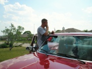 A High Class Auto Glass technician at work